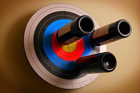 Image credit: [doityourself.com](http://www.doityourself.com/stry/wine-rack-archery-target)